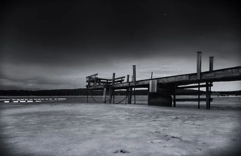 Abandoned pier on frozen lake | 2012 | Nordic