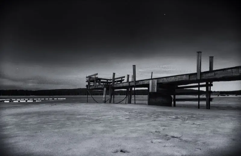 Abandoned pier on frozen lake | 2012 | Nordic