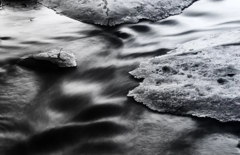 Flowing stream over icy rocks | 2012 | Nordic